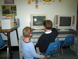 Daycare children learning on the Computer